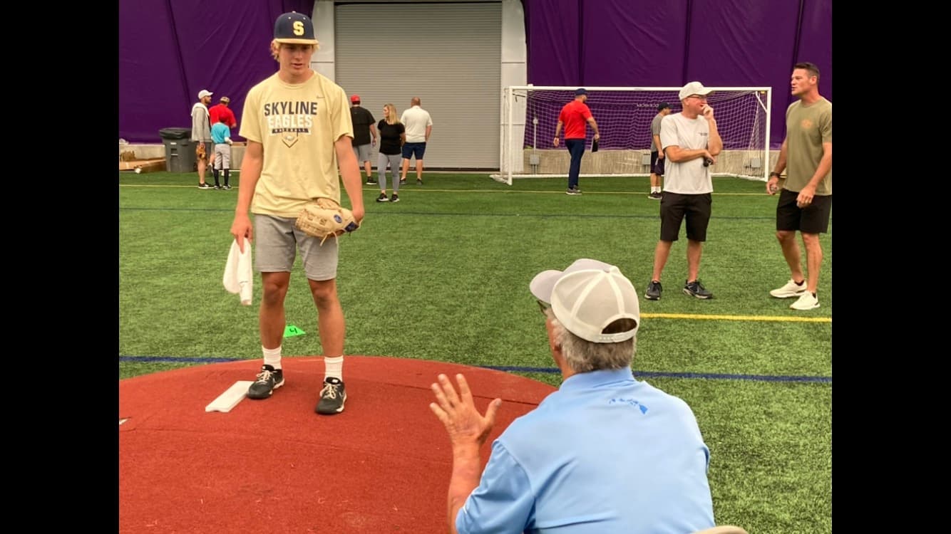 Tom House coaching a pitcher
